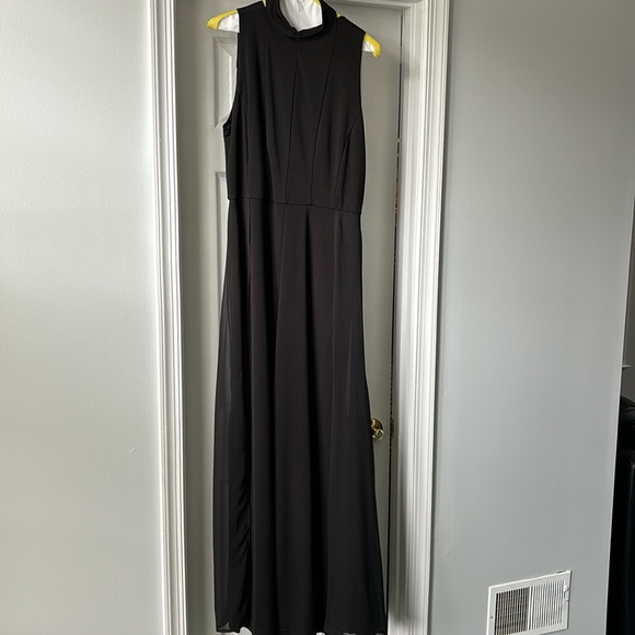 Women’s jumpsuit with glowing chiffon cape in the back. - Picture 1 of 5